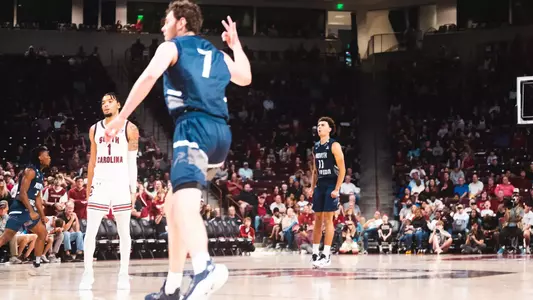 Kamrin Oriol celebrating a game-tying three-pointer