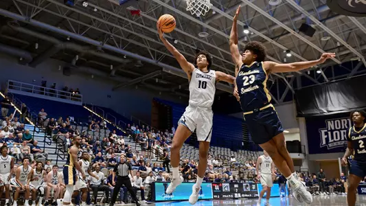 Josh Harris going for a layup against Charleston Southern