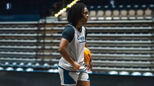 Kaila Rougier holding ball at practice