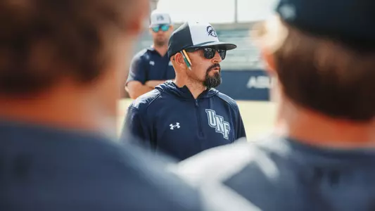 Joe Mercadante talking to the huddle