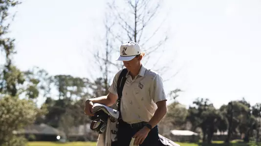 Andrew Riley walking off the course