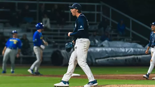 Baseball pitcher yelling after strikeout