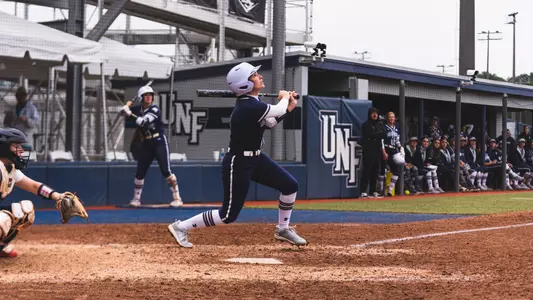 Chloe Culp hits ball at the plate