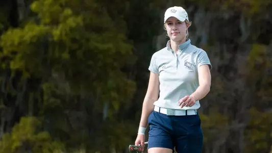 Christin Eisenbeiss walking on the green