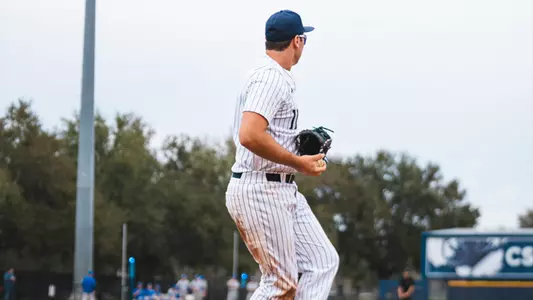 Cade Bush catching the ball at first
