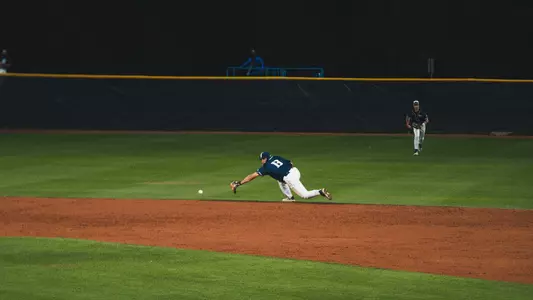 Tripp McKinley driving for ball at second