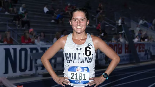 Erica Fisher placing first in the 5000m