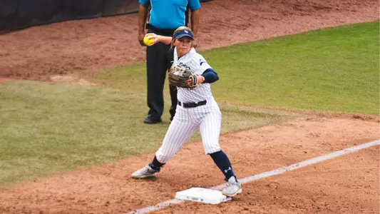Abi Annett throwing to first
