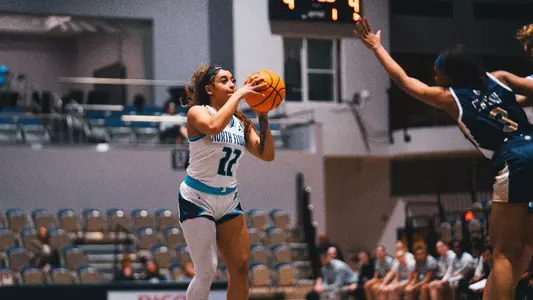 Lyric Swann shooting a three