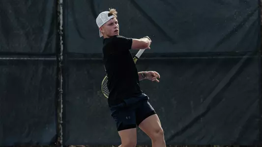 Andreas Scott Action shot at Tennis Complex