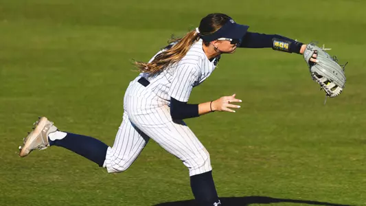 Madisyn Federico throwing ball to infield