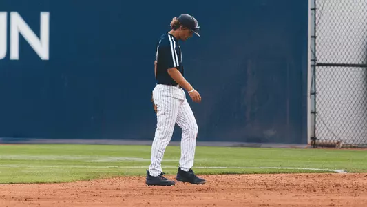 Finn Howell walking back to third