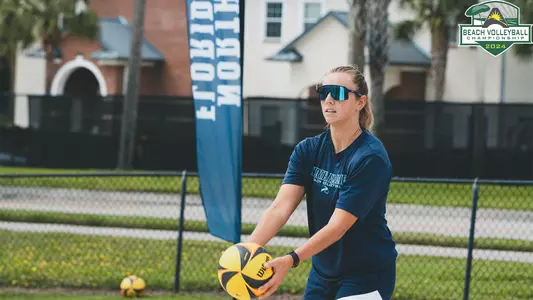 Iris Fletcher preparing to serve at practice