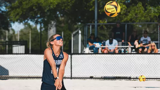 Madison Espy going for the dig at the Cooper Beach Volleyball Complex