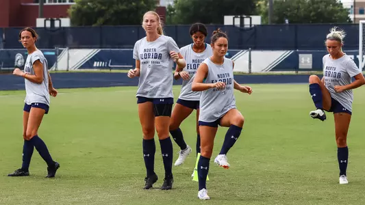 UNF women's soccer warming up