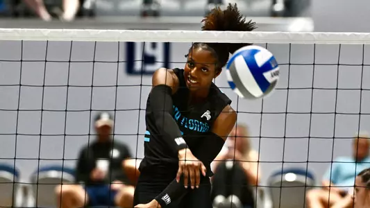 Jacqueline Arrington going for the kill against Rhode Island