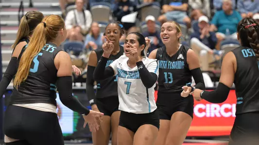 Kamila Mieles celebrating with her team
