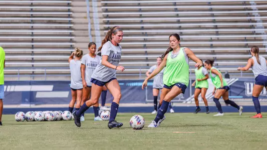 Amanda Hartmann dribbling at women's soccer practice