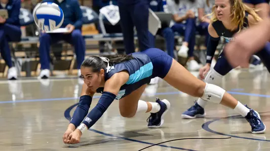 Kamila Mieles going for a dig