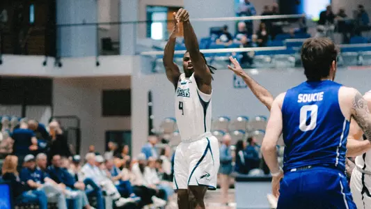 Jaylen Smith shoots three-pointer