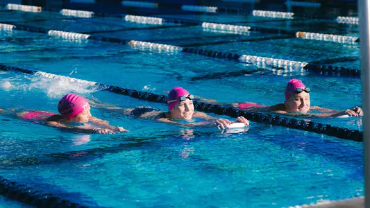 Maggie Johnson, Abby Noga and Riley McCormick at swim practice