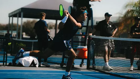 Joao Portugal up close to net FAU