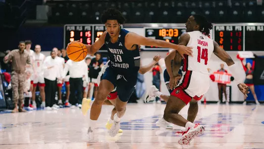 Josh Harris driving to basket