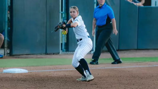 Hadlee Reichert throwing to first