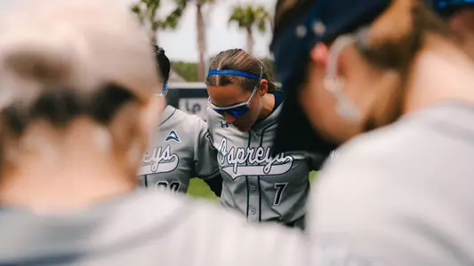 Lauren Brock team huddle