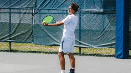 Joao Portugal serves against Stetson