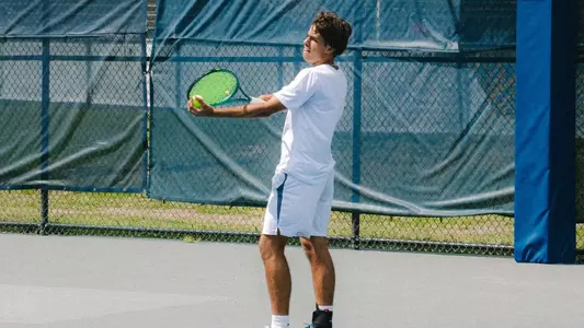 Joao Portugal serves against Stetson
