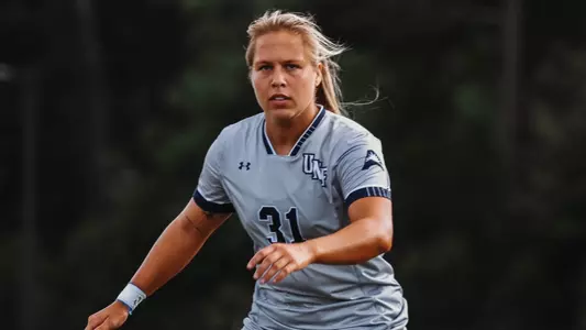 Allie Fekany looking on the field