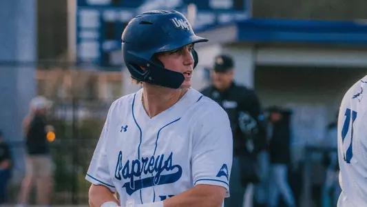Carter White walking to dugout