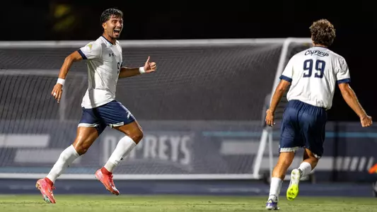 Forward Geraldo Neto celebrates with forward David Perez after a goal