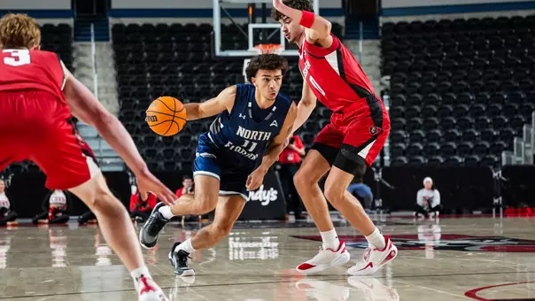 2025-26 North Florida Men's Basketball - Kamrin Oriol dribbling at Austin Peay