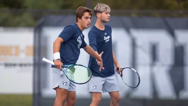 Andreas Messis and Joao Portugal Celebrating During Doubles Play