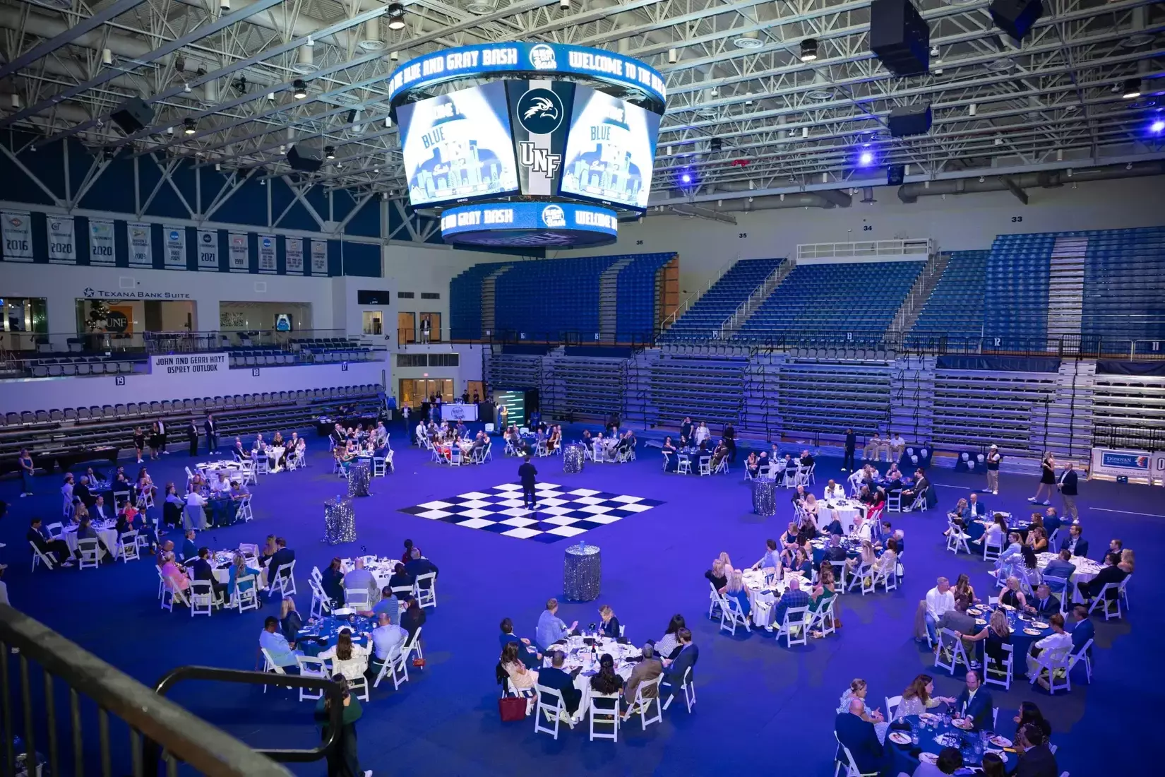 Wide shot of UNF Arena during blue and gray bash.