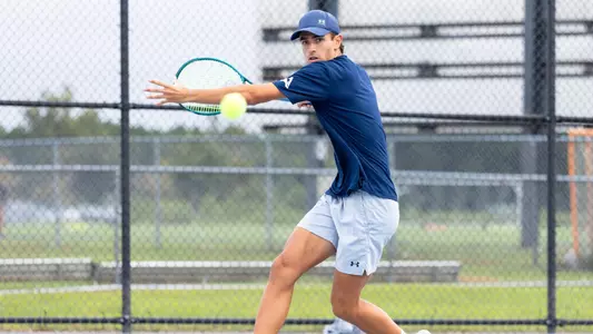 Enrique Pena Prepares To Hit The Ball