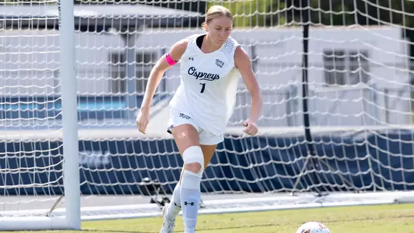 Senior defender Zoe Looker Preparing to Kick Ball