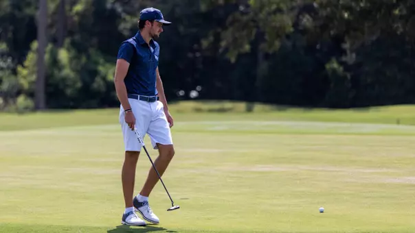 Filippo Serra walking up to approach putt