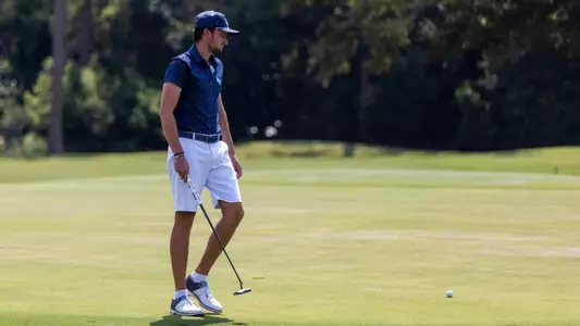 Filippo Serra walking up to approach putt
