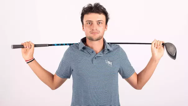 2025-26 North Florida Men's Golf - Filippo Serra Driver On The Shoulders