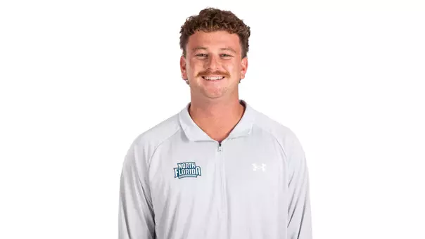 White backdrop photo of Assistant Coach Makai Lipson