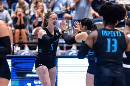 Katelyn Bowman high fiving teammate