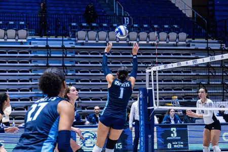Sofia Dawson setting the ball
