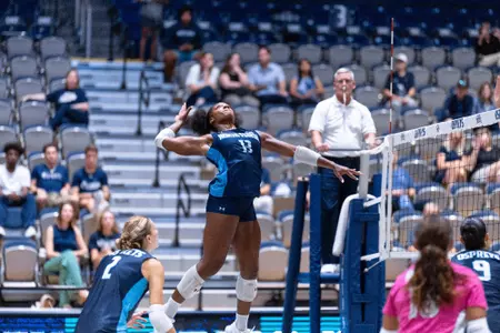 UNF Volleyball player prepares to hit ball