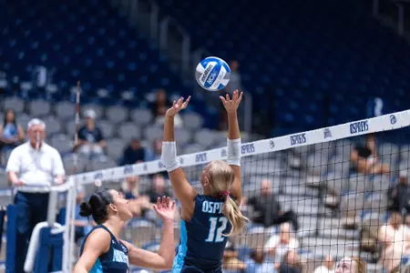 UNF Volleyball player sets ball