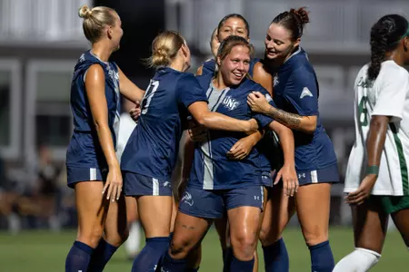 UNF Women's Soccer Team celebrates a goal
