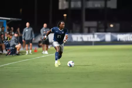 Germain Kapela dribbling the ball
