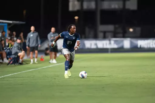 Germain Kapela dribbling the ball